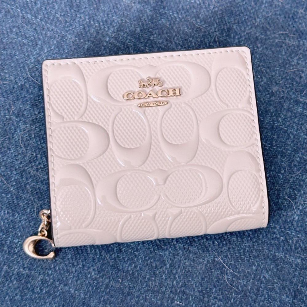 Coach snap zip wallet patent signature